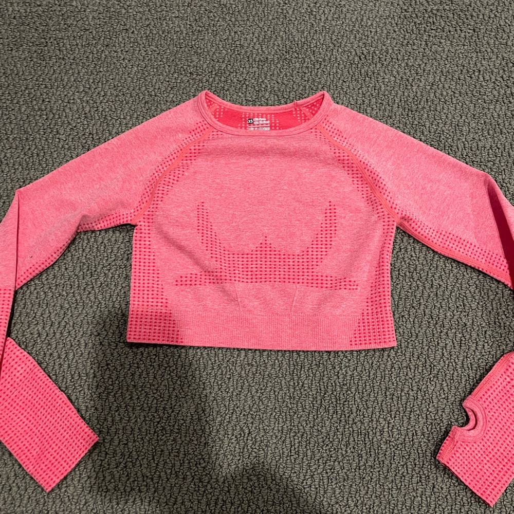 Bright pink long sleeve workout top